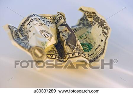 Stock Photo - Crumpled dollar bill. Fotosearch