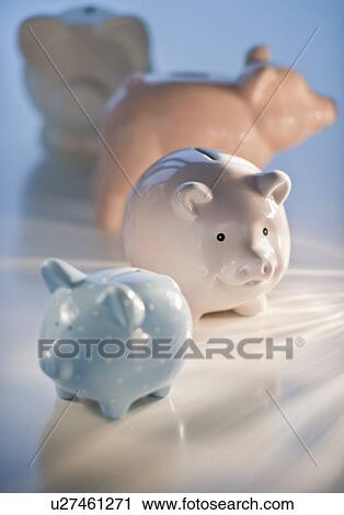 Four piggy banks View Large Photo Image Stock Image - Four piggy banks. Fotosearch
