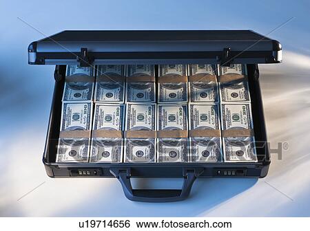Stock Photograph - Money in a briefcase. Fotosearch