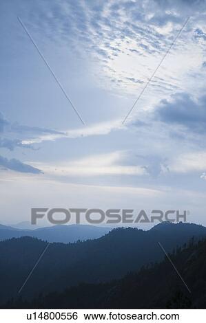 Stock Photograph - Mountain landscape with trees. Fotosearch