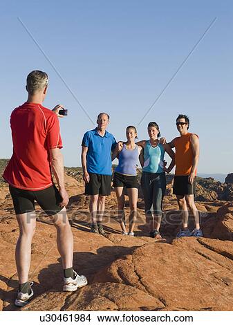Runners at Red Rock taking a break View Large Photo Image Picture - Runners at Red Rock taking a break. Fotosearch