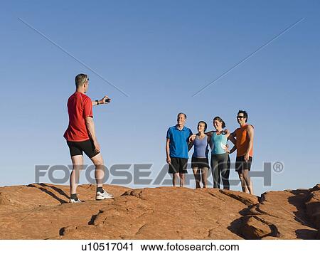 Runners at Red Rock taking a break View Large Photo Image Stock Image - Runners at Red Rock taking a break. Fotosearch