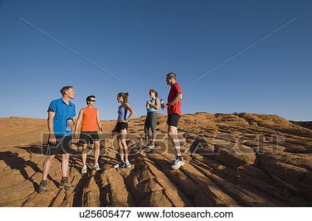 Runners at Red Rock taking a break View Large Photo Image Stock Photo - Runners at Red Rock taking a break. Fotosearch