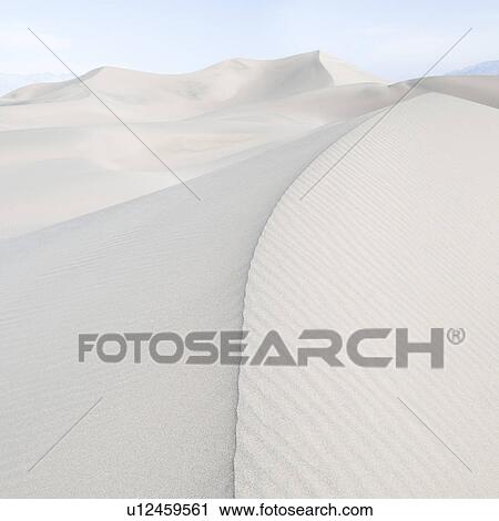 Sand dunes in the desert View Large Photo Image Stock Image - Sand dunes in the desert. Fotosearch