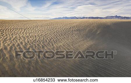 Sand dunes in the desert View Large Photo Image Stock Image - Sand dunes in the desert. Fotosearch