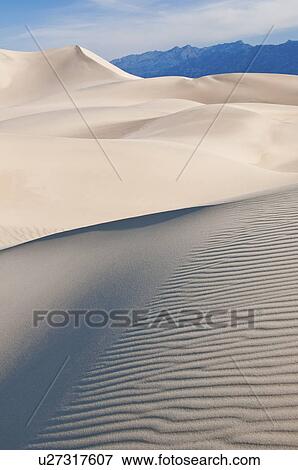 Sand dunes in the desert View Large Photo Image Stock Photo - Sand dunes in the desert. Fotosearch