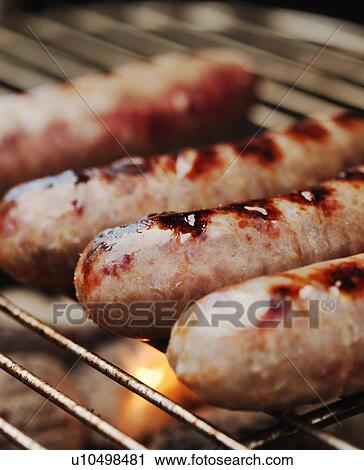 Sausages on a barbeque View Large Photo Image Stock Image - Sausages on a barbeque. Fotosearch