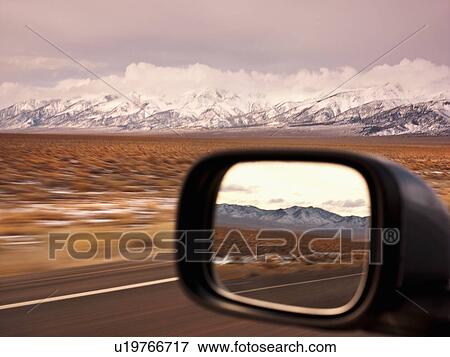 Side mirror shot from interior of car View Large Photo Image Stock Photo - Side mirror shot from interior of car. Fotosearch