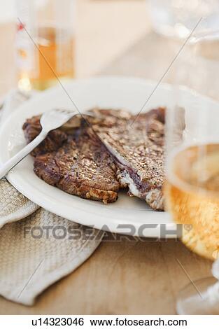 Steak and beer View Large Photo Image Stock Photograph - Steak and beer. Fotosearch