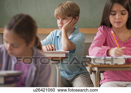 Students in a classroom View Large Photo Image Stock Image - Students in a classroom. Fotosearch