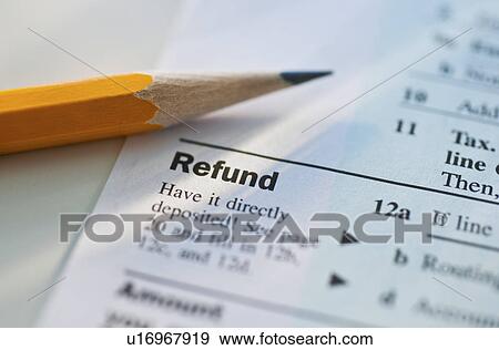 Tax form and a pencil View Large Photo Image Stock Photo - Tax form and a pencil. Fotosearch