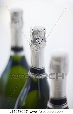 Three bottles of champagne View Large Photo Image Stock Photo - Three bottles of champagne. Fotosearch