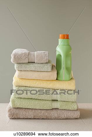Towels and laundry detergent View Large Photo Image Picture - Towels and laundry detergent. Fotosearch