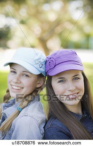 Stock Photograph - Two sisters outdoors. Fotosearch