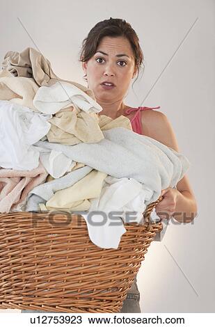 Woman doing laundry View Large Photo Image Stock Image - Woman doing laundry. Fotosearch