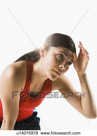 Woman tired from training View Large Photo Image Stock Photo - Woman tired from training. Fotosearch