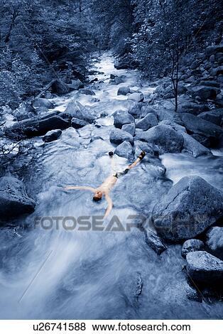 Stock Photo - A body in a stream. Fotosearch