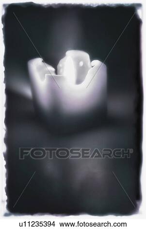 A candle View Large Photo Image Picture - A candle. Fotosearch