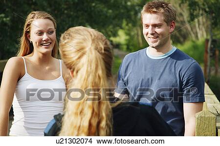 A conversation View Large Photo Image Picture - A conversation. Fotosearch