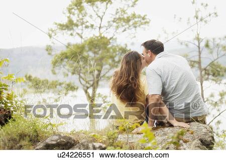 A couple kiss View Large Photo Image Stock Image - A couple kiss. Fotosearch