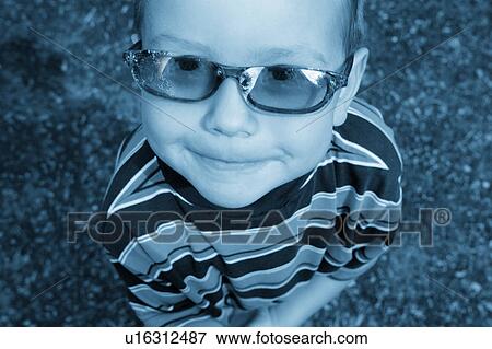 A cute child with trendy sunglasses View Large Photo Image Stock Photo - A cute child with trendy sunglasses. Fotosearch