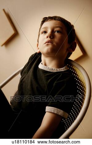 Picture - A daydreaming child. Fotosearch