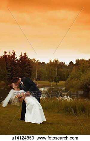 A dip and a kiss View Large Photo Image Stock Image - A dip and a kiss. Fotosearch