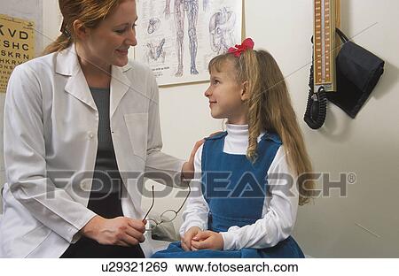 Stock Photo - A doctor and a child. Fotosearch