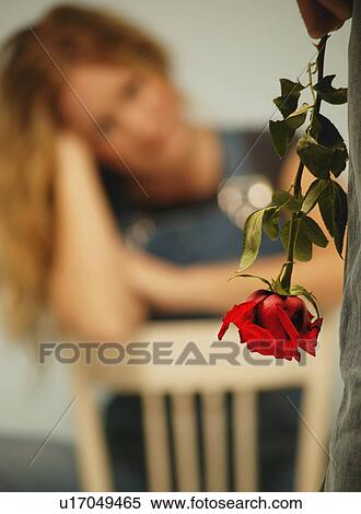 A flower for a girl View Large Photo Image Stock Photography - A flower for a girl. Fotosearch