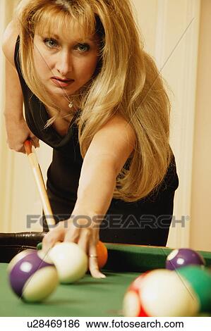 Stock Photograph - A game of pool. Fotosearch