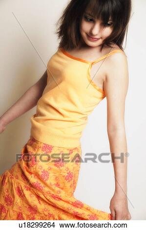 A girl twirls skirt View Large Photo Image Picture - A girl twirls skirt. Fotosearch