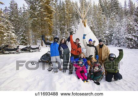 Stock Photo - A group of people in the snow. Fotosearch