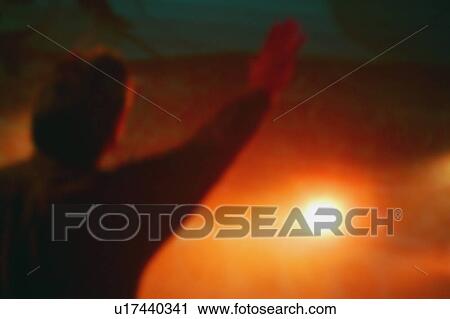 A man with arms raised View Large Photo Image Stock Image - A man with arms raised. Fotosearch