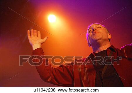 A man worshipping View Large Photo Image Stock Photo - A man worshipping. Fotosearch