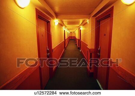 Picture - A narrow hallway in a hotel. Fotosearch