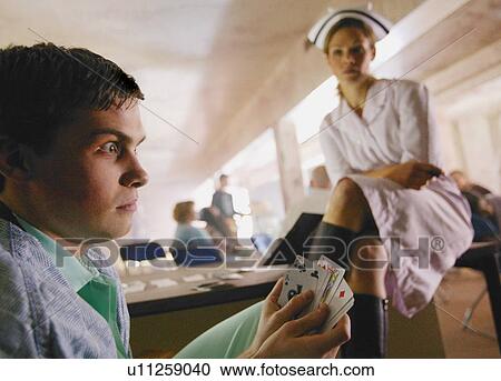 A nurse and a man in a hospital View Large Photo Image Stock Image - A nurse and a man in a hospital. Fotosearch