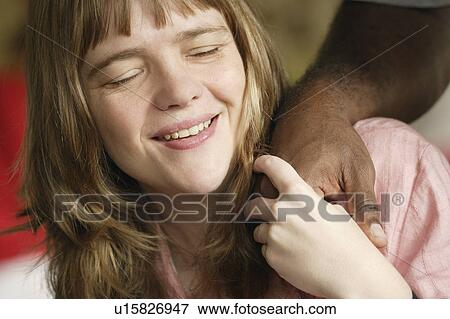 Stock Photo - A reassuring touch from someone. Fotosearch