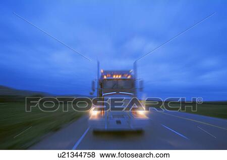 A semi at night View Large Photo Image Stock Photo - A semi at night. Fotosearch