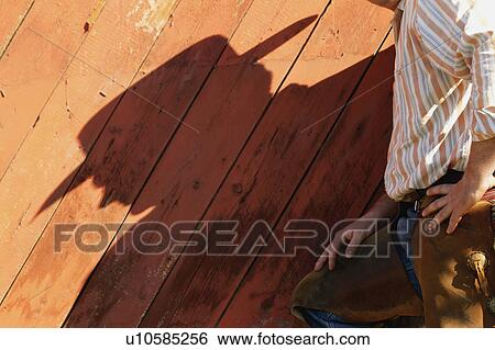 A shadow of a cowboy View Large Photo Image Stock Photograph - A shadow of a cowboy. Fotosearch