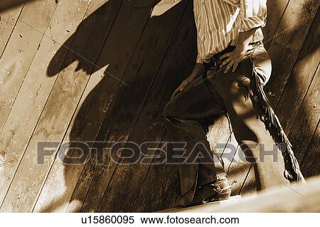 A shadow of a cowboy View Large Photo Image Stock Photography - A shadow of a cowboy. Fotosearch