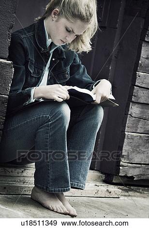 A student reading View Large Photo Image Stock Photo - A student reading. Fotosearch