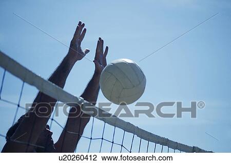 A volleyball block View Large Photo Image Stock Image - A volleyball block. Fotosearch