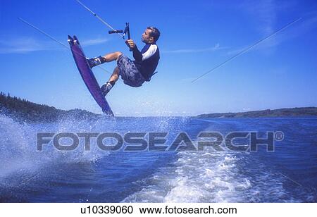 A wake boarder jump View Large Photo Image Stock Image - A wake boarder jump. Fotosearch