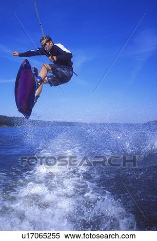 A wake boarder jump View Large Photo Image Stock Photography - A wake boarder jump. Fotosearch