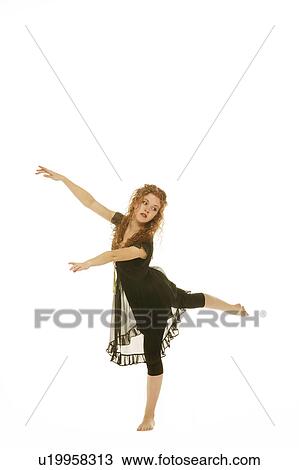 Stock Image - A woman dances. Fotosearch