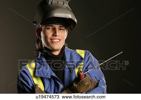 Aboriginal man with welding equipment View Large Photo Image Stock Image - Aboriginal man with welding equipment. Fotosearch