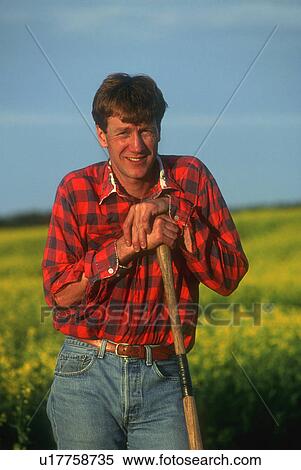 Agricultural worker View Large Photo Image Stock Photography - Agricultural worker. Fotosearch