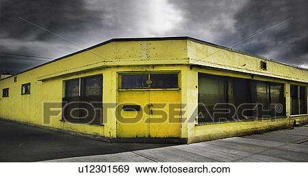 Stock Photo - An old yellow building. Fotosearch