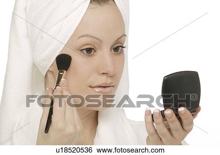 Applying makeup View Large Photo Image Stock Photograph - Applying makeup. Fotosearch