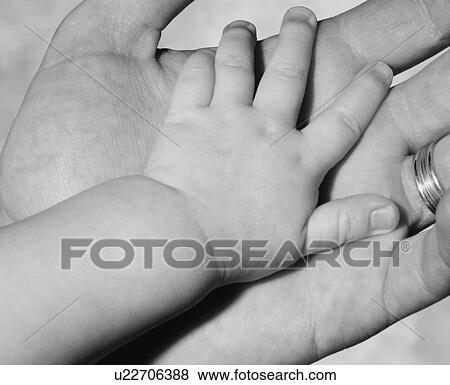 Baby's and Father's hands View Large Photo Image Stock Photo - Baby's and Father's hands. Fotosearch